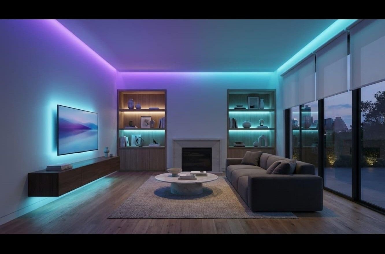 Living room at night with colour-changing LED cove and shelf lighting scene