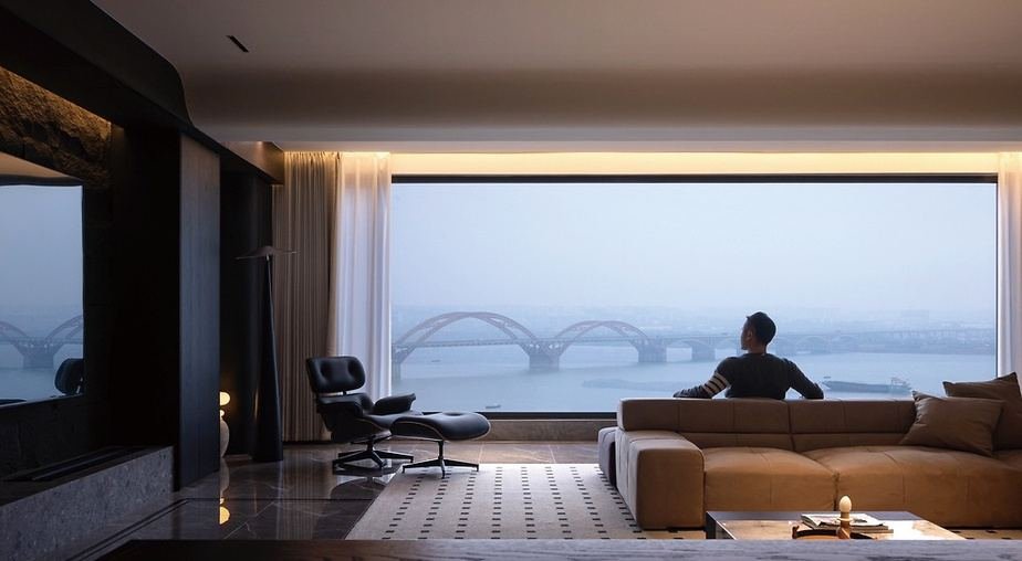Living room with motorised curtains and a panoramic view