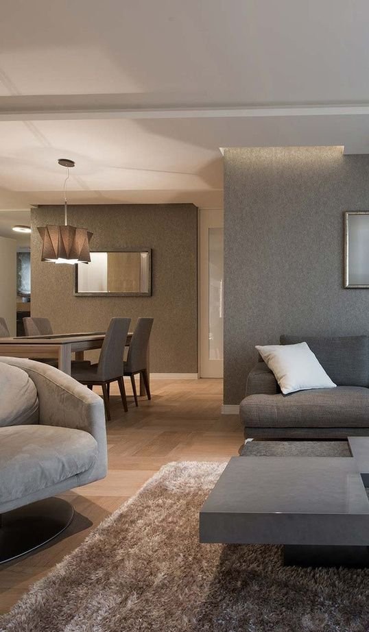Living room with textured feature wall paneling and custom joinery